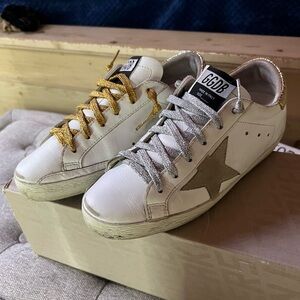 White Sneakers with Gold and Silver Accents
